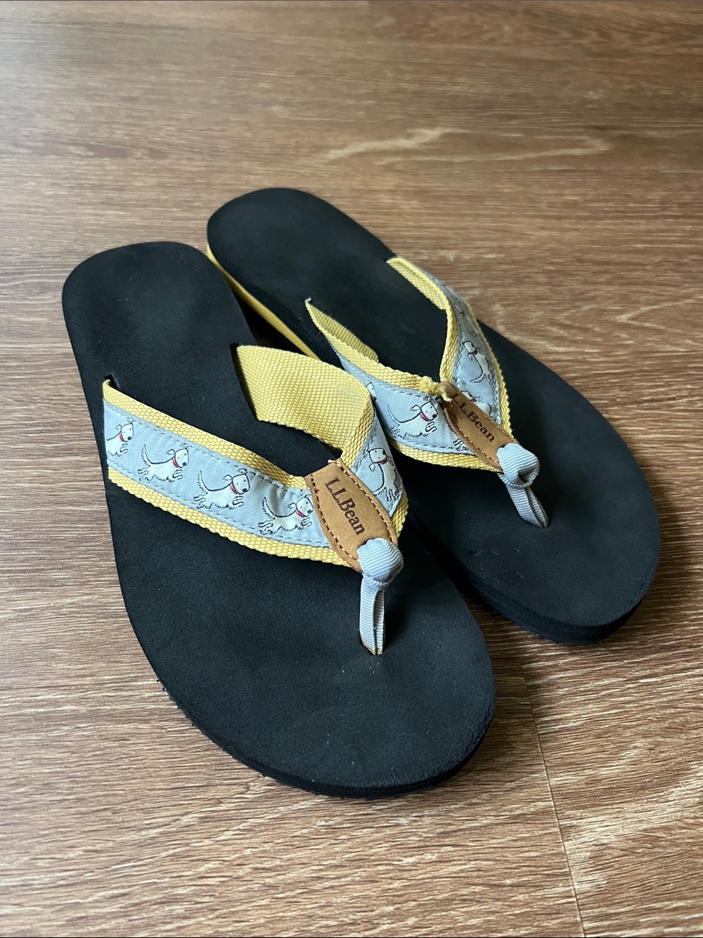 L.L. Bean Black Flip Flop Sandals with Yellow-Trimmed Straps